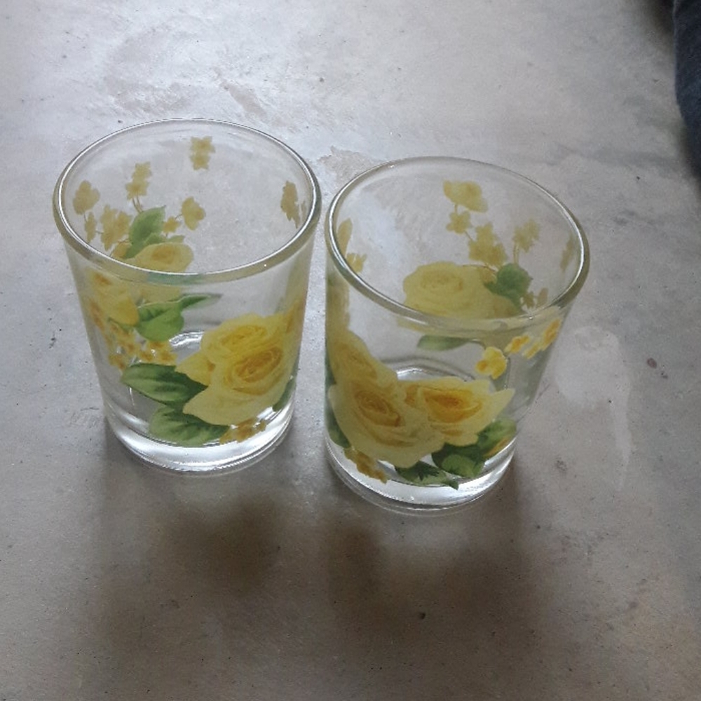 A pair of Glass T-Lite Candle Holders